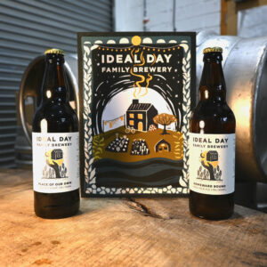 Place of our Own: Coolship Stout and Homeward Bound: IPA bottles next to an A4 art print.